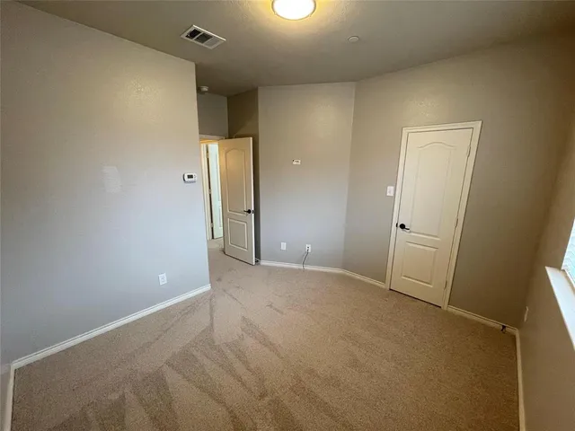 an empty room with an entryway