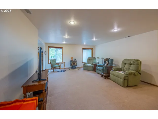 a living room with furniture and a table