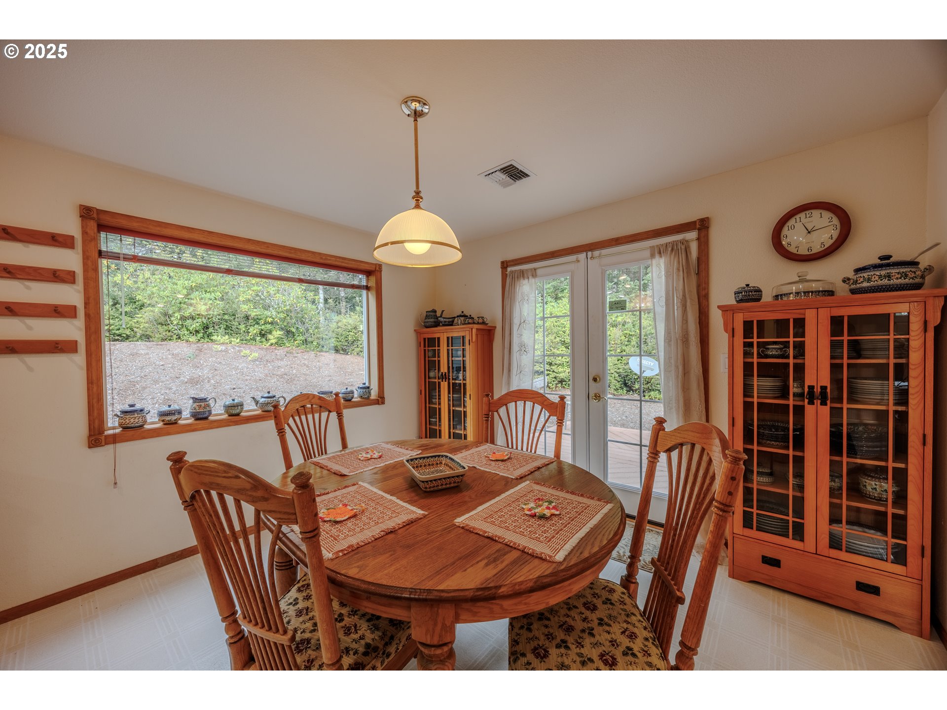 2184 13th Street Florence, OR 97439 - Photo 14 of 44 a view of a dining room with furniture window and outside view