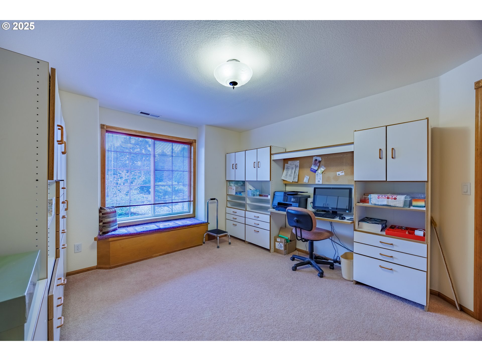 2184 13th Street Florence, OR 97439 - Photo 27 of 44 a bedroom with furniture and a window