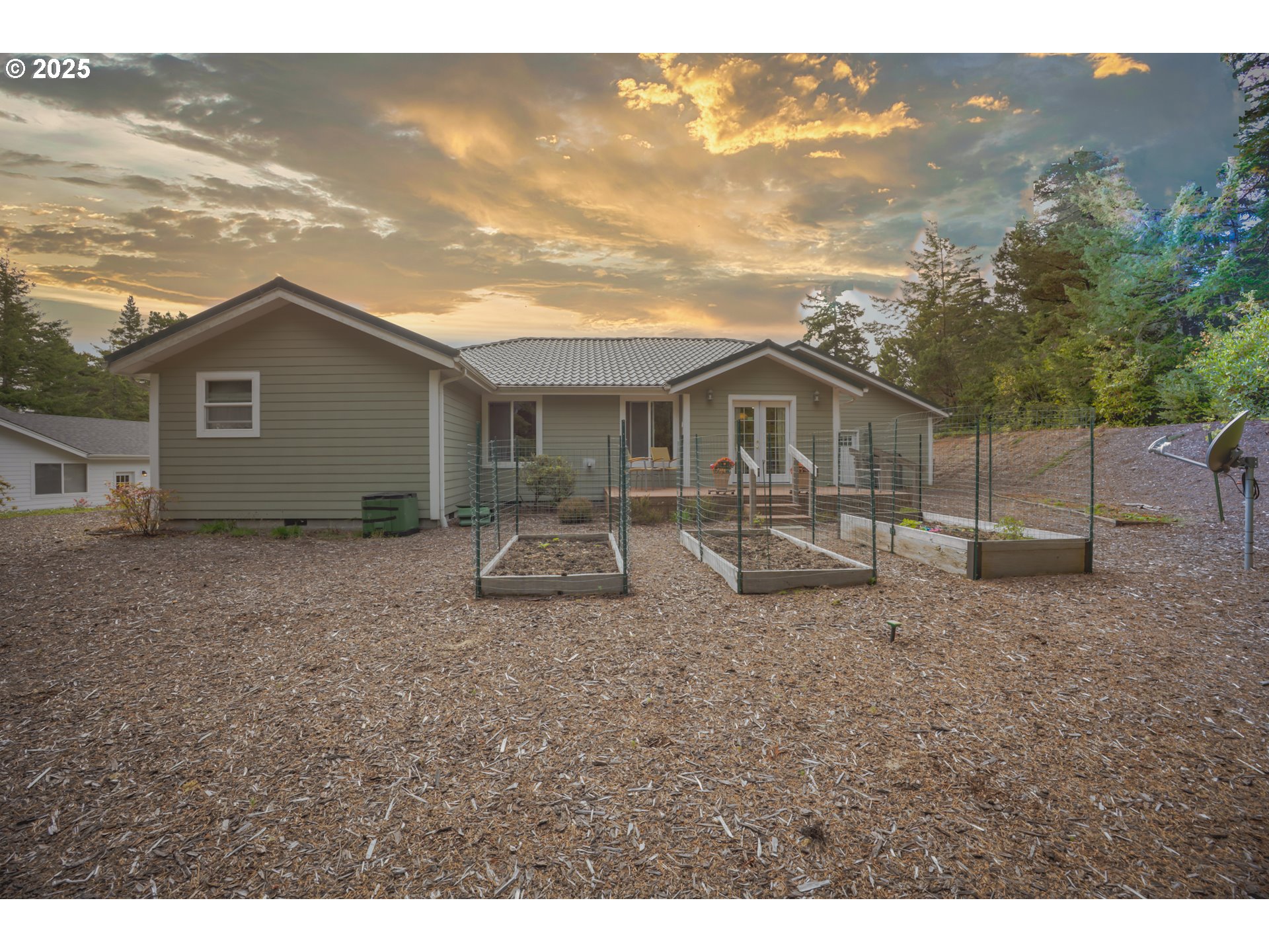 2184 13th Street Florence, OR 97439 - Photo 37 of 44 a house view with a backyard space