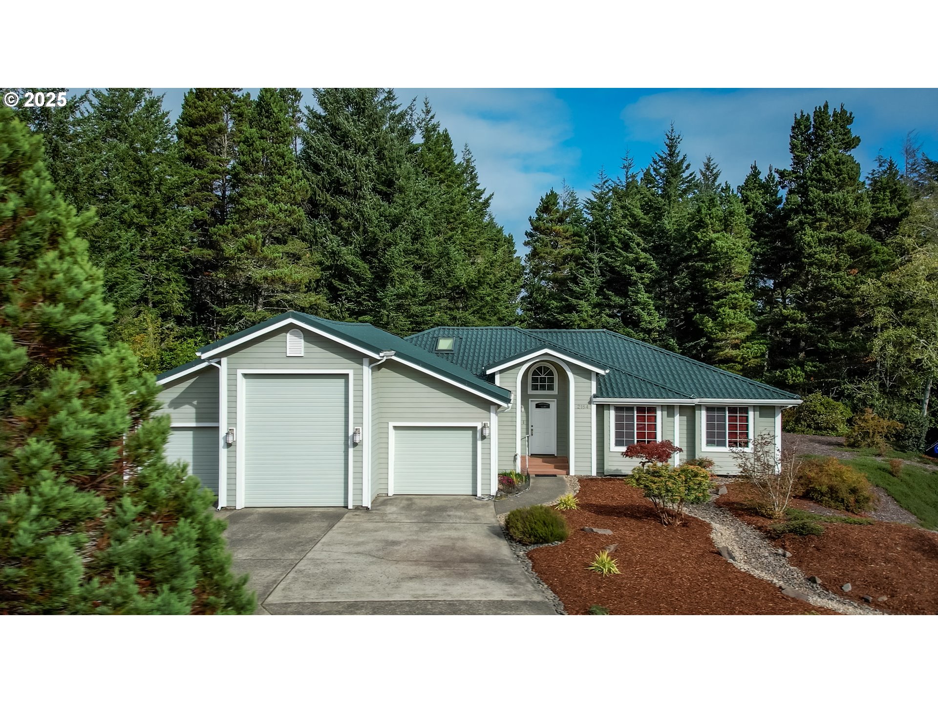 2184 13th Street Florence, OR 97439 - Photo 4 of 44 a bathroom with a sink and a yard