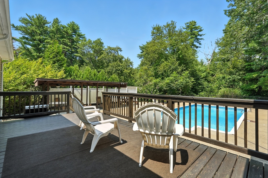 158 Chudy Street Three Rivers, MA 01080 - Photo 18 of 42 a view of a chair and tables in the balcony