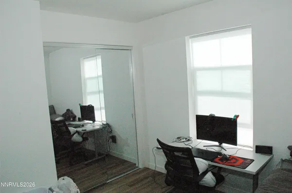 a workspace with furniture and window