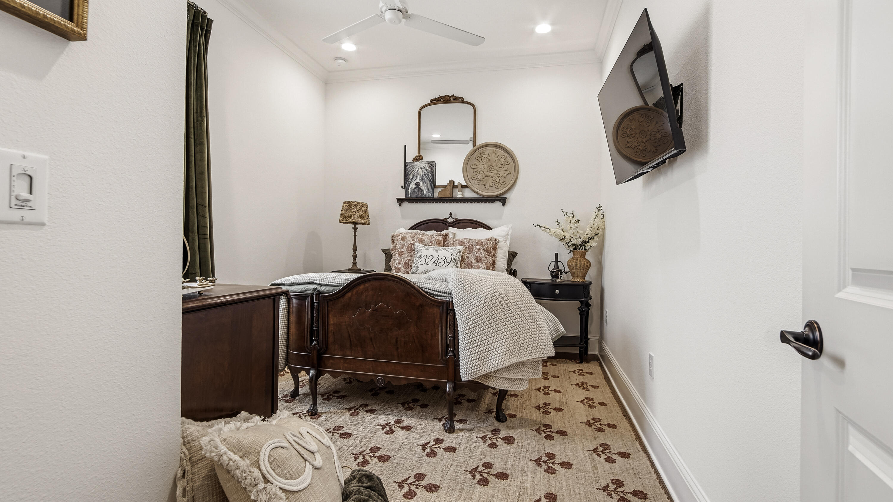 33 Caymus Cove Freeport, FL 32439 - Photo 35 of 144 a bedroom with a bed and a mirror
