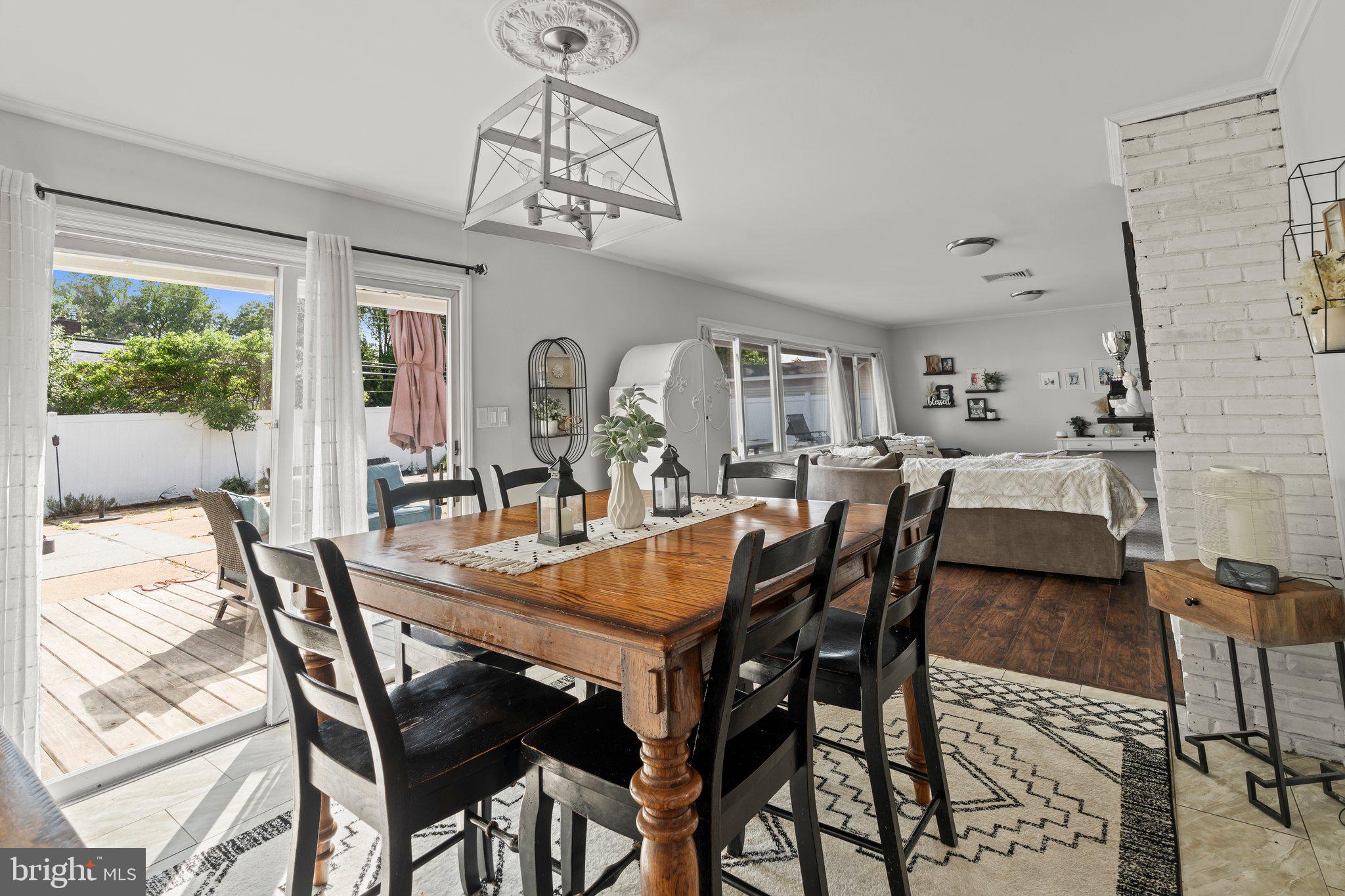 30 Roving Road Levittown, PA 19056 - Photo 13 of 40 a view of a dining room with furniture window and outside view