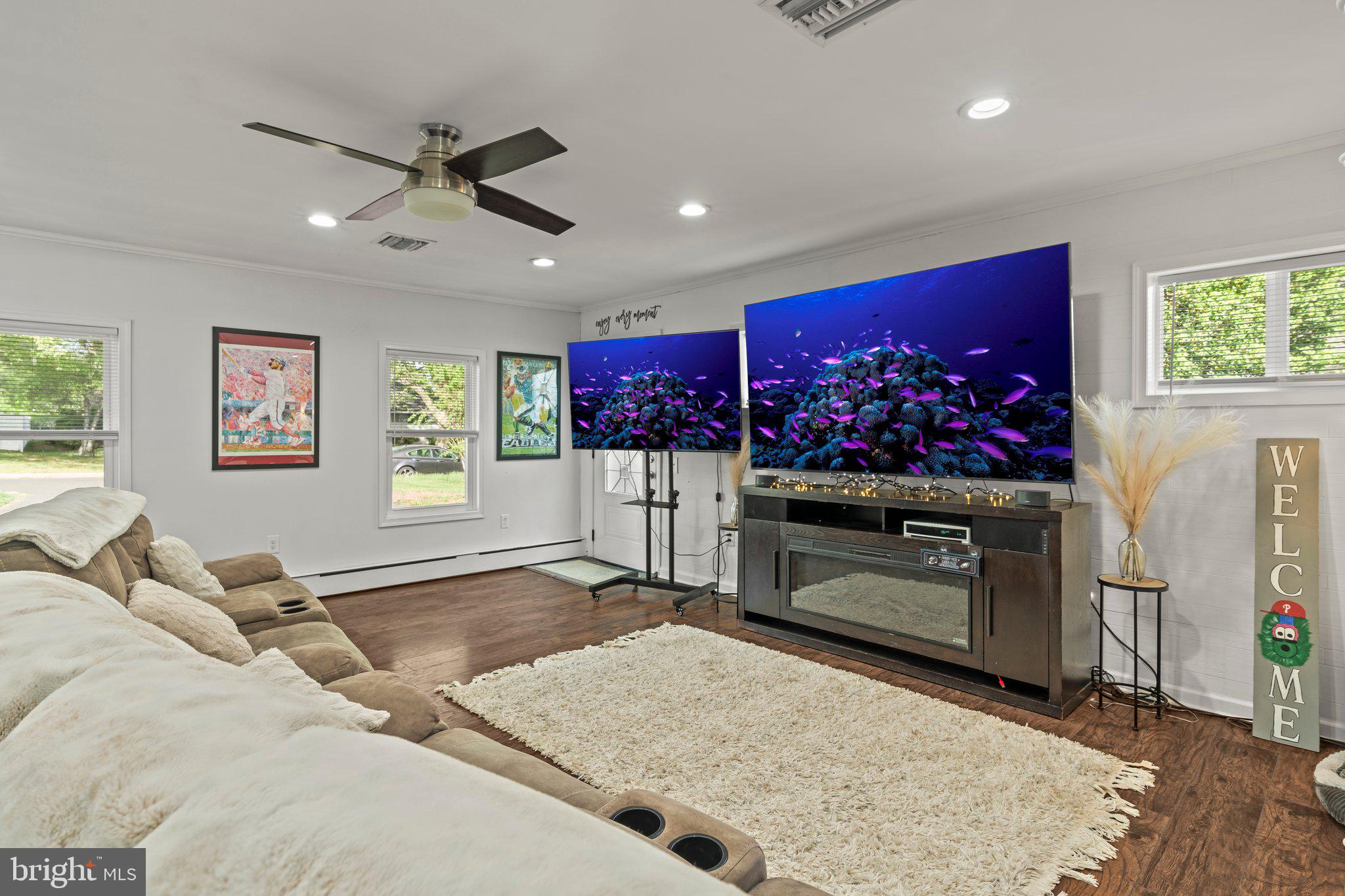 30 Roving Road Levittown, PA 19056 - Photo 16 of 40 a living room with furniture and a flat screen tv