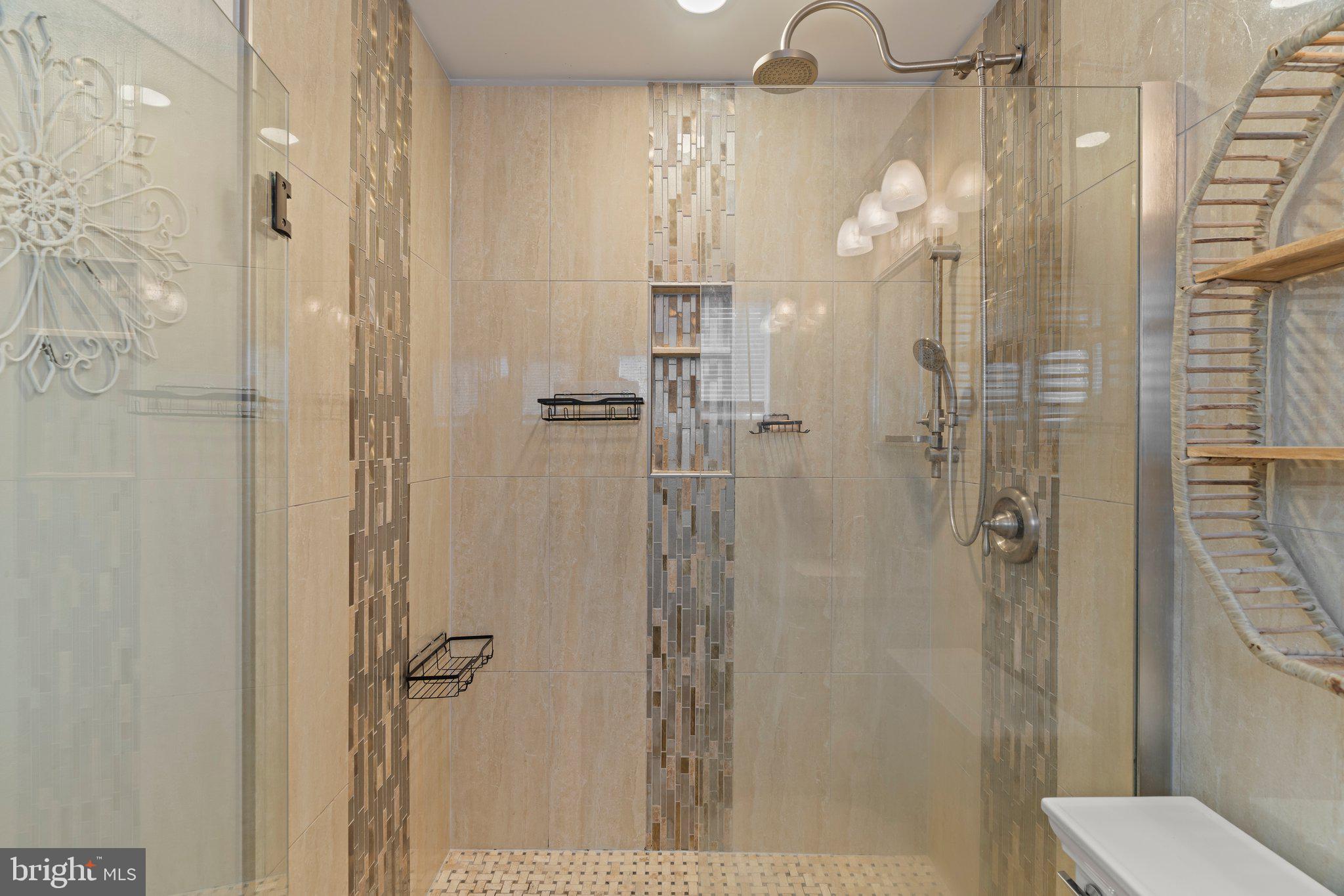 30 Roving Road Levittown, PA 19056 - Photo 18 of 40 a bathroom with a shower and a toilet