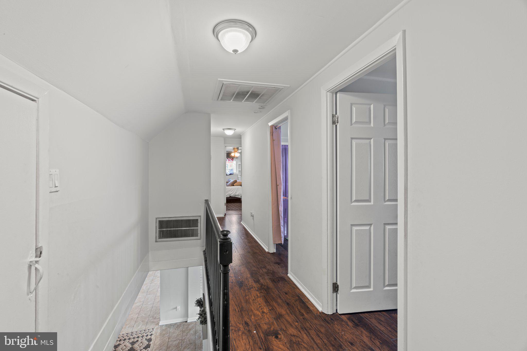 30 Roving Road Levittown, PA 19056 - Photo 28 of 40 a view of hallway with wooden floor