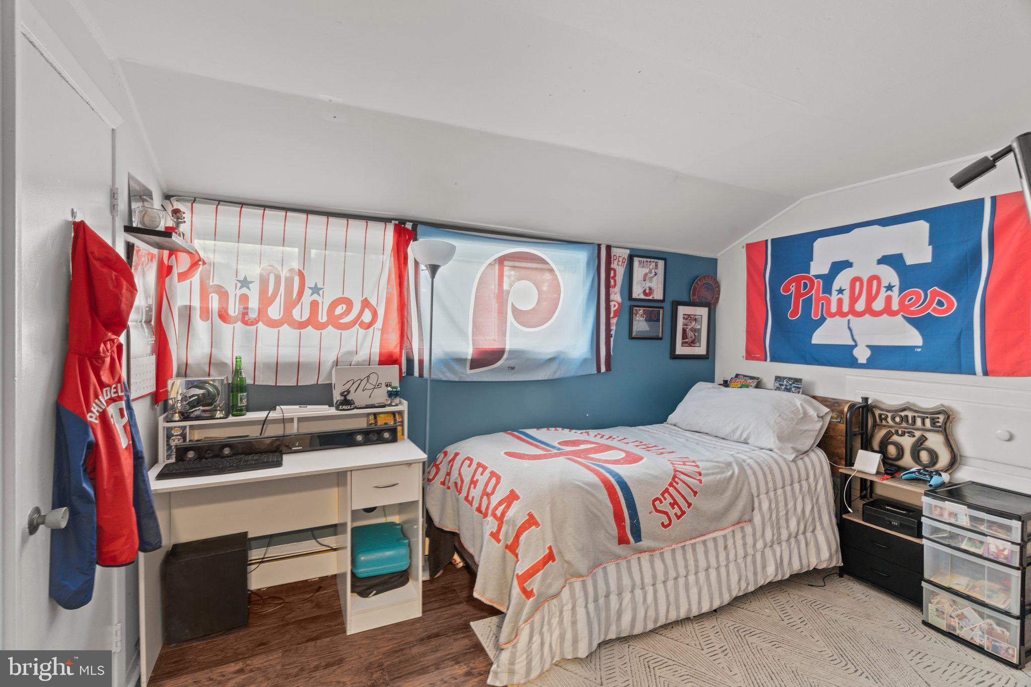 30 Roving Road Levittown, PA 19056 - Photo 30 of 40 a bedroom with a bed and a painting on the wall