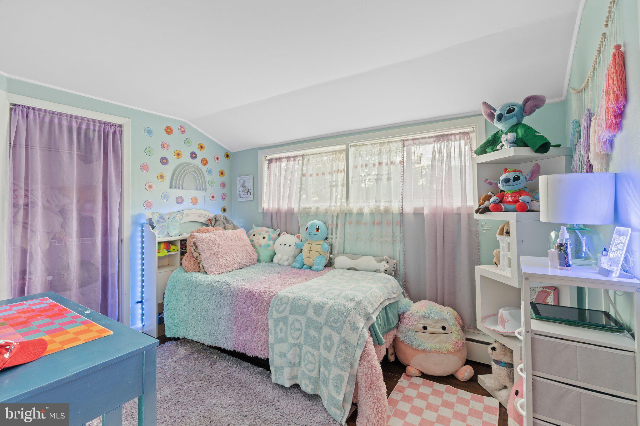 30 Roving Road Levittown, PA 19056 - Photo 32 of 40 a bedroom with a bed and a window