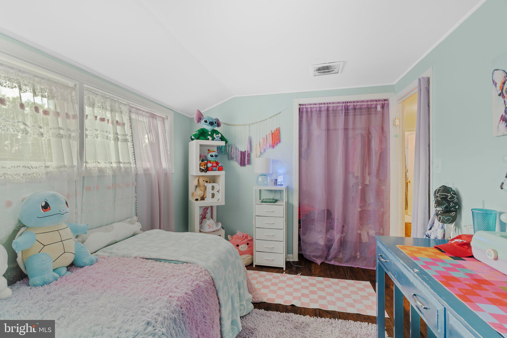 30 Roving Road Levittown, PA 19056 - Photo 33 of 40 a bedroom with a bed and a window