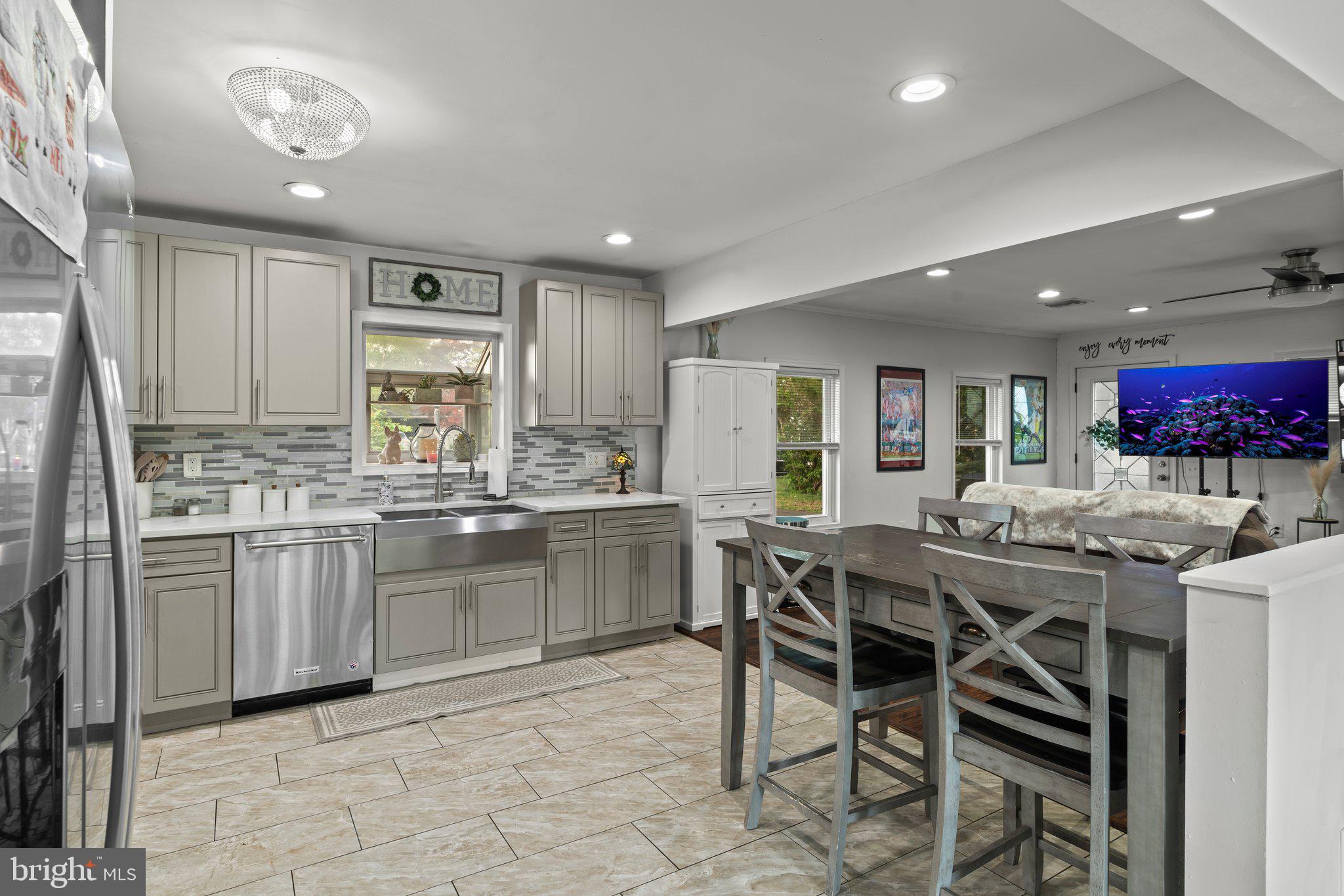 30 Roving Road Levittown, PA 19056 - Photo 6 of 40 a kitchen with a table and chairs in it