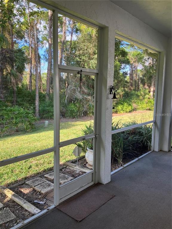 Undisclosed Address Sarasota, FL 34238 - Photo 21 of 26 a view of a garden from a room