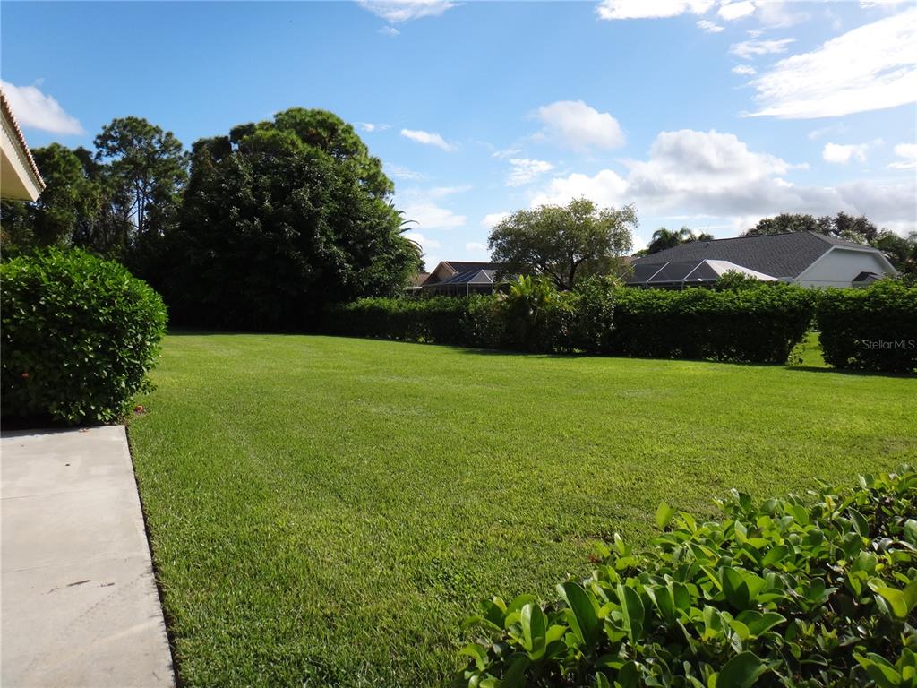 Undisclosed Address Sarasota, FL 34238 - Photo 25 of 26 a view of yard with swimming pool and green space