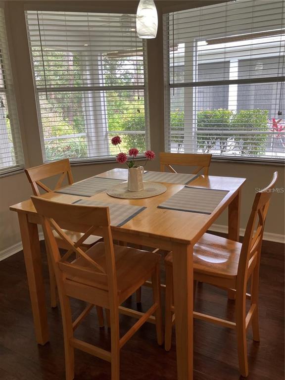 Undisclosed Address Sarasota, FL 34238 - Photo 9 of 26 a view of a dining room with furniture and window