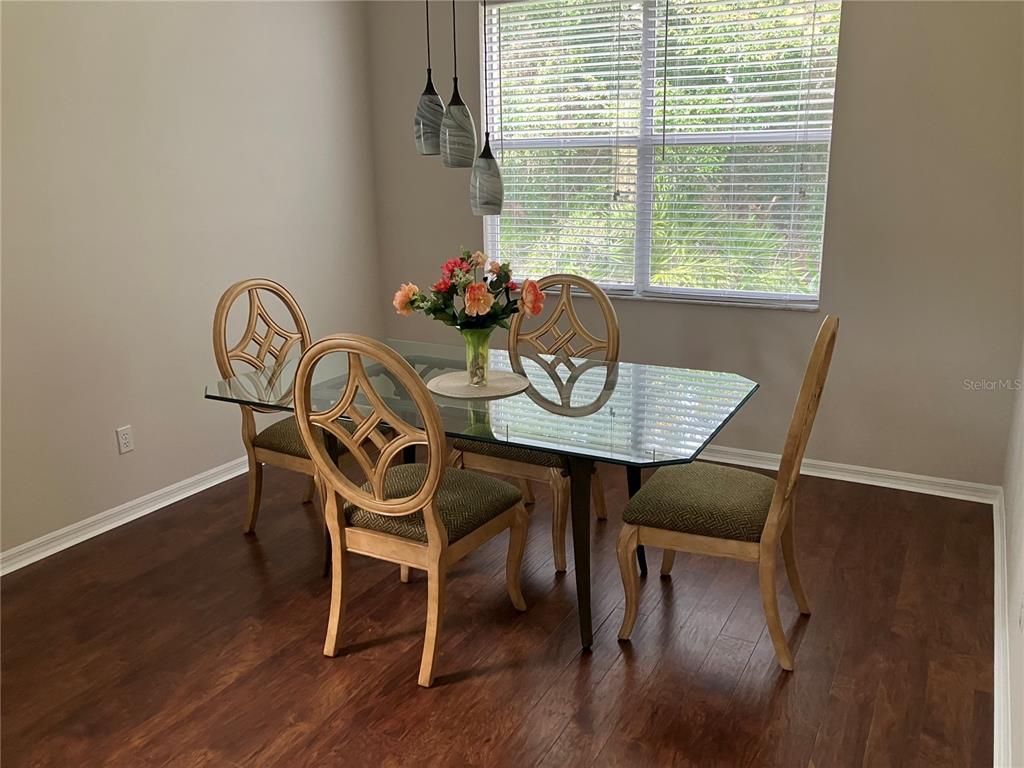 Undisclosed Address Sarasota, FL 34238 - Photo 10 of 26 a dining room with furniture and window