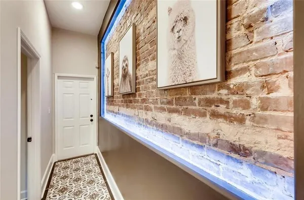 a bathroom with a granite countertop sink and a shower curtain