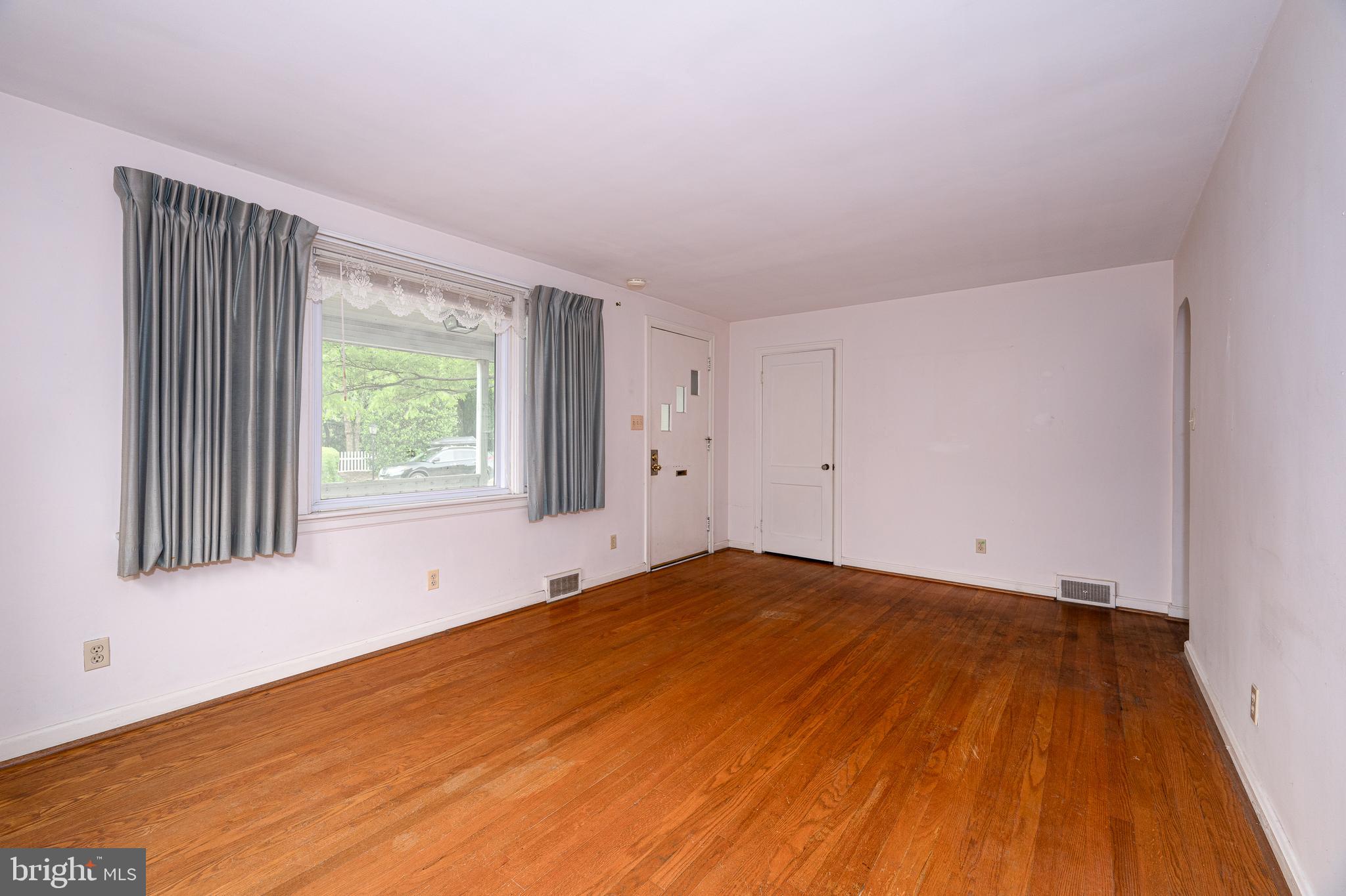 2 Norva Avenue Frederick, MD 21701 - Photo 6 of 36 a view of empty room with wooden floor and fan