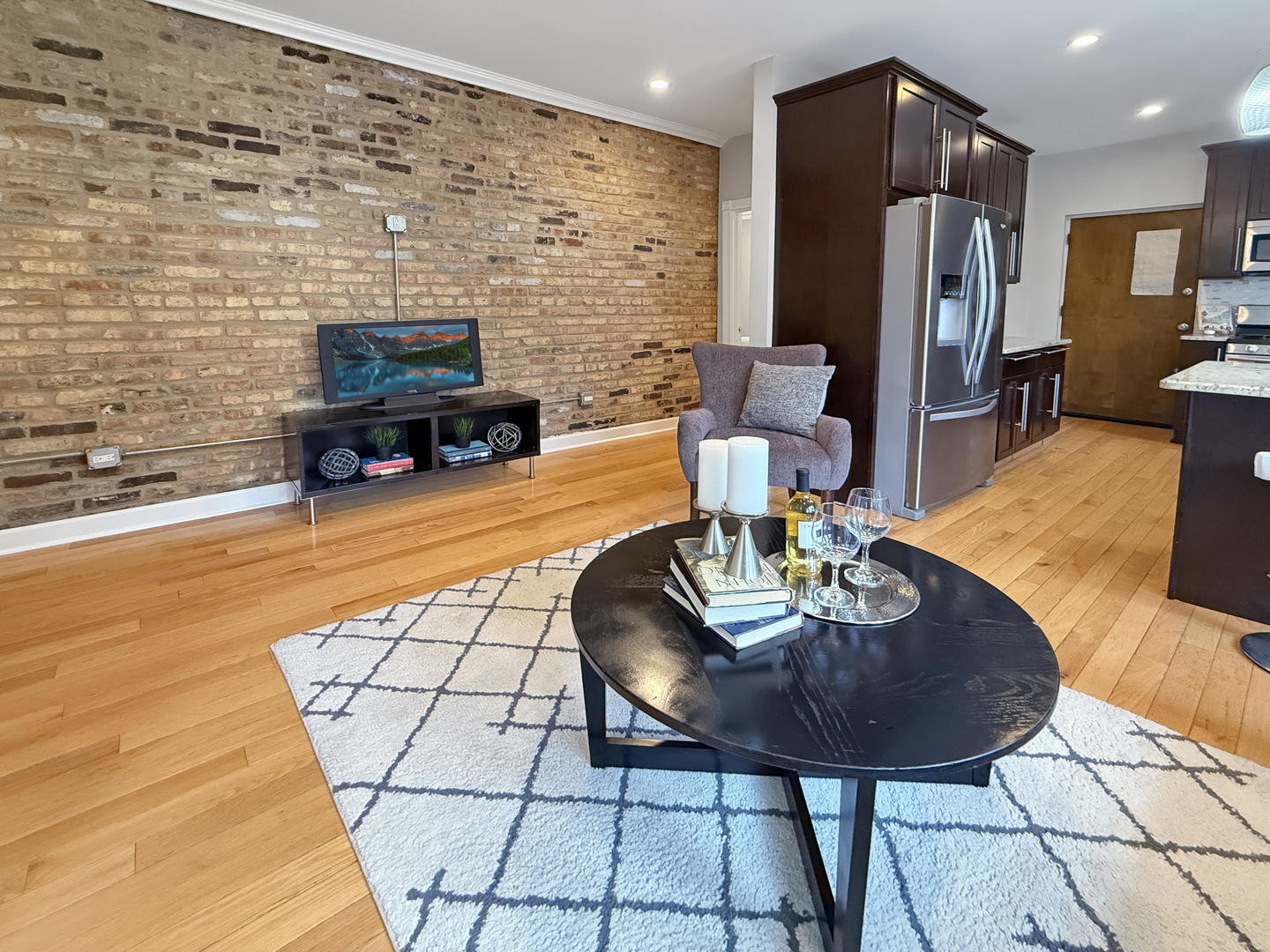 1325 West Addison Street, Unit 1A Chicago, IL 60613 - Photo 7 of 15 a view of a dining room with furniture
