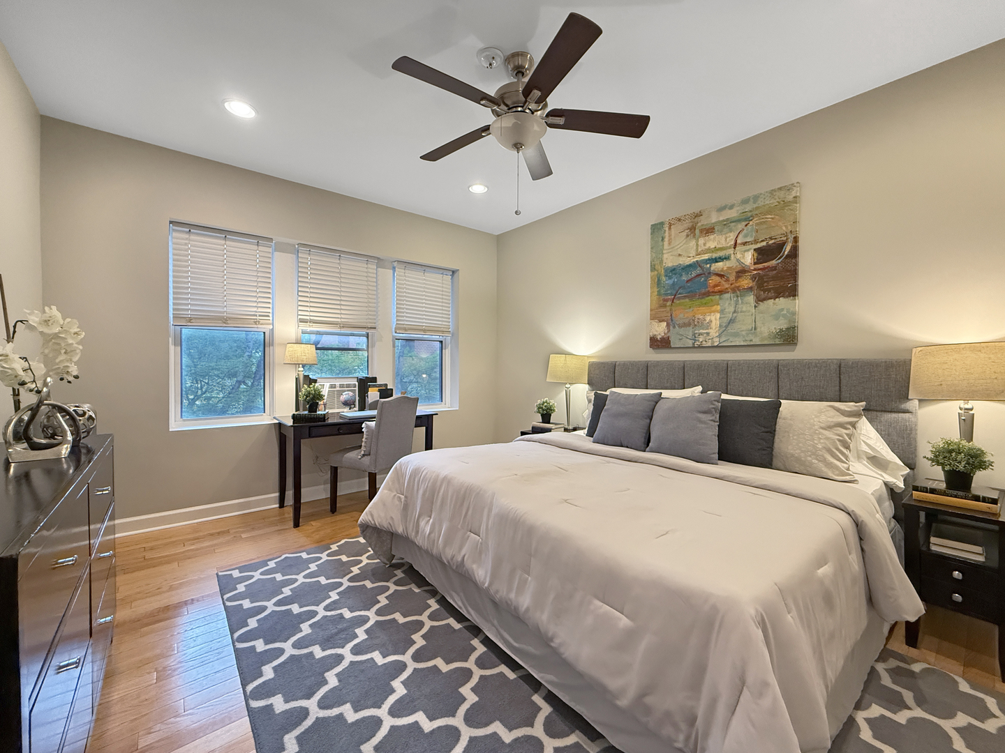 1325 West Addison Street, Unit 1A Chicago, IL 60613 - Photo 8 of 15 a bed room with a bed and furniture