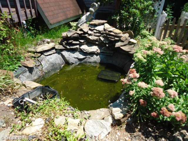 1180 Old Mail Rte Road King, NC 27021 - Photo 12 of 12 Exterior Front. gold fish pond