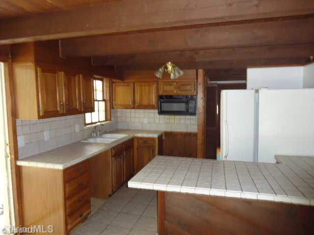 1180 Old Mail Rte Road King, NC 27021 - Photo 3 of 12 Kitchen.