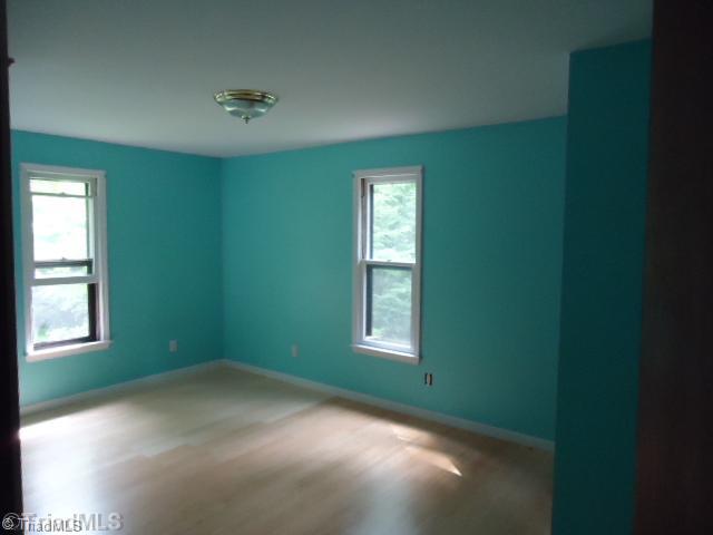 1180 Old Mail Rte Road King, NC 27021 - Photo 5 of 12 Master Bedroom.