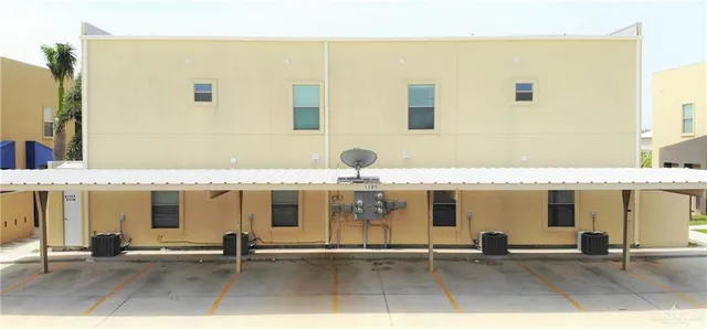 a front view of a building with glass windows