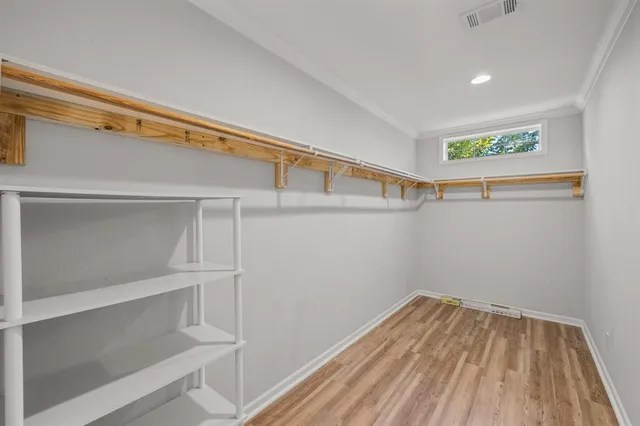 a view of a room with racks on the wall