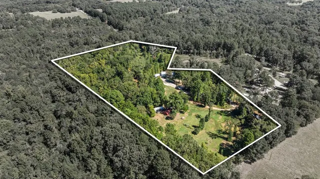 a view of a two chairs in the balcony