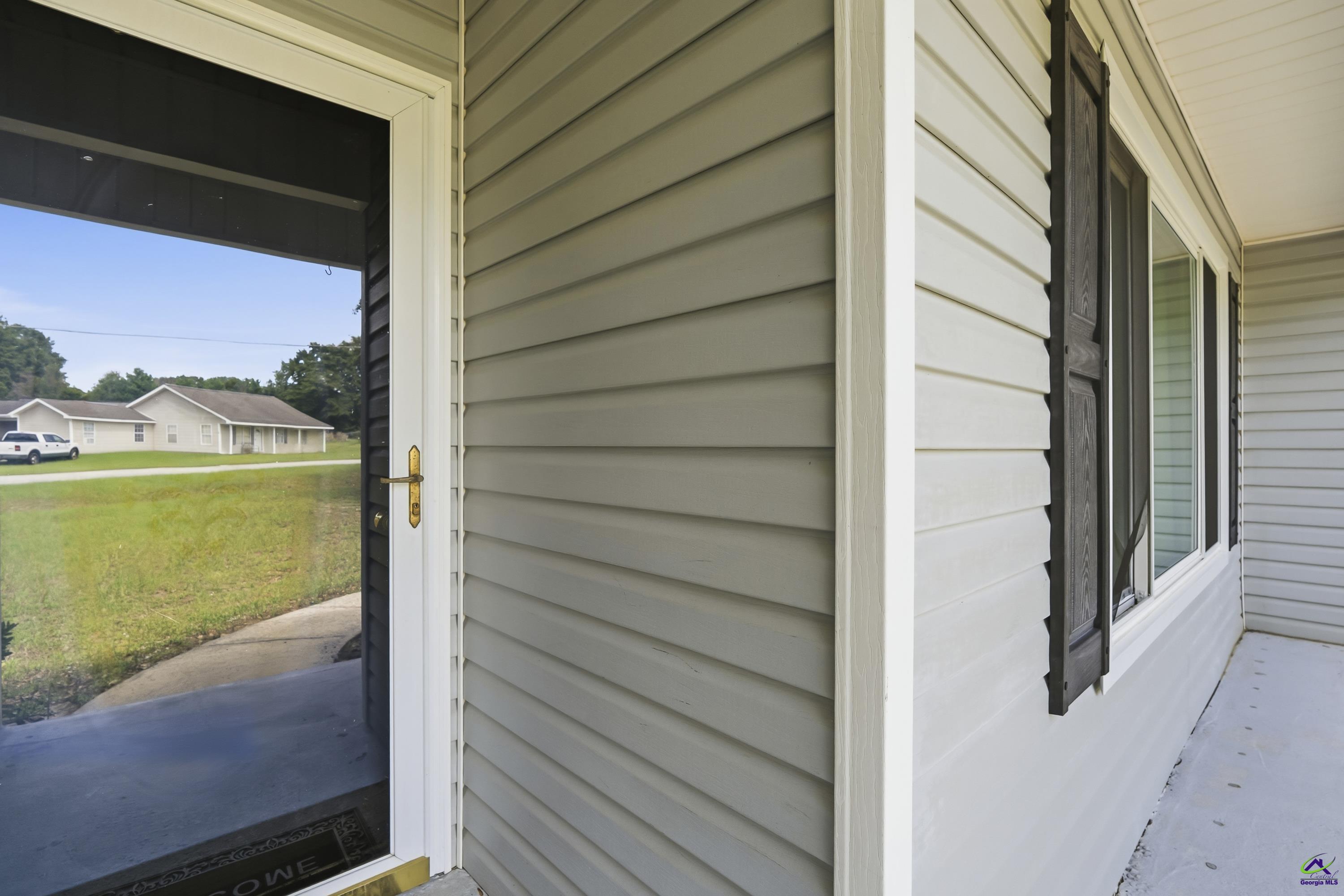 23 Breeze Point Byron, GA 31008 - Photo 3 of 38 a view of front door
