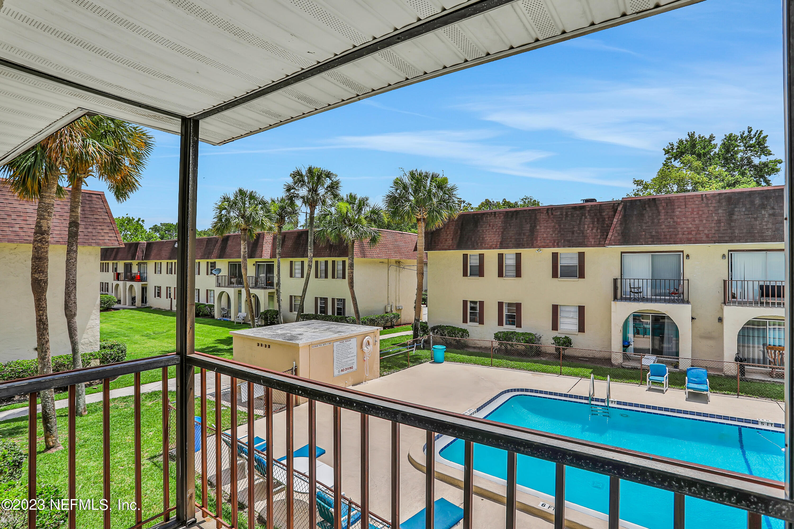 1735 El Camino Road, Unit 5 Jacksonville, FL 32216 - Photo 29 of 32 a balcony view with a garden