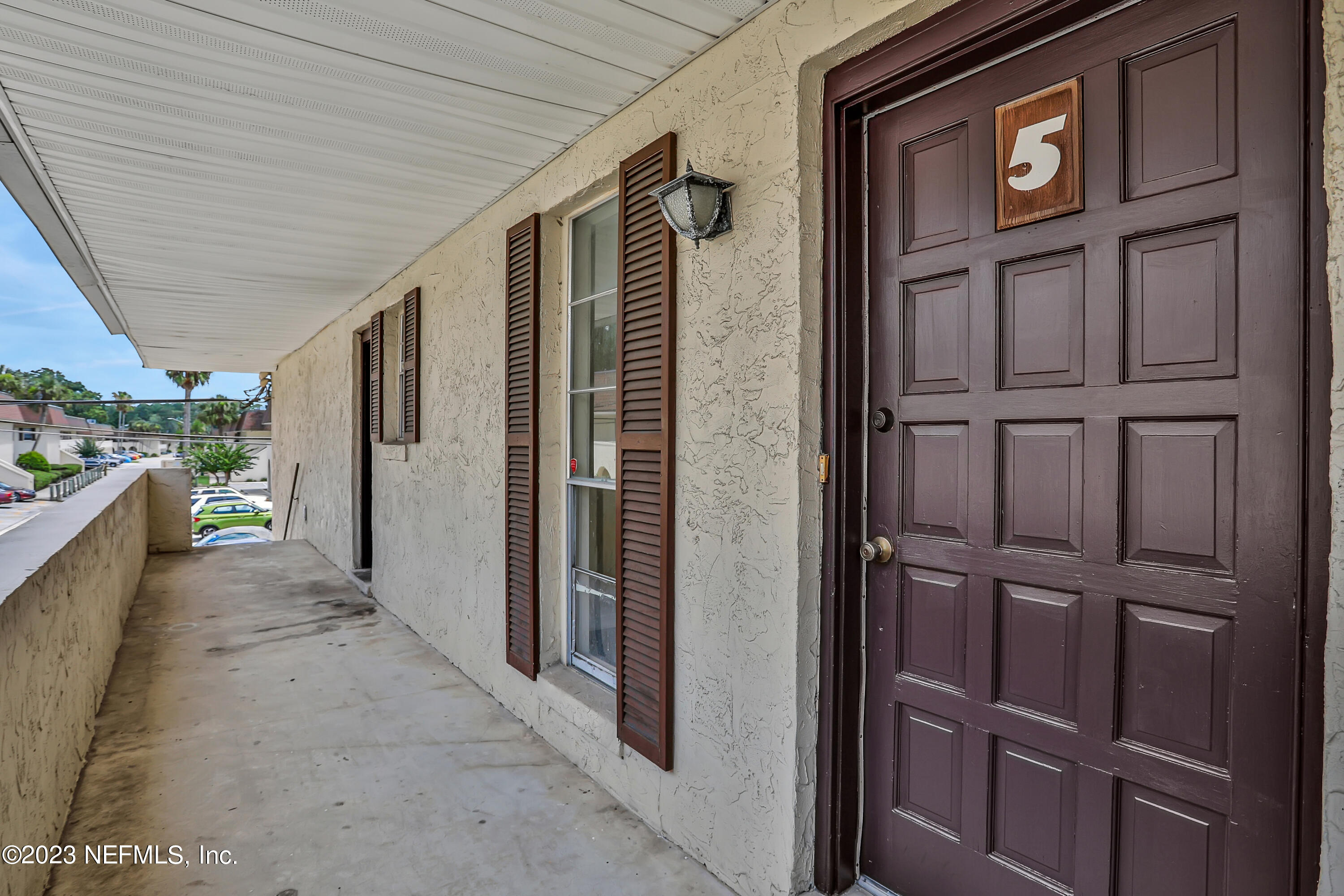 1735 El Camino Road, Unit 5 Jacksonville, FL 32216 - Photo 30 of 32 a view of a pathway along the house