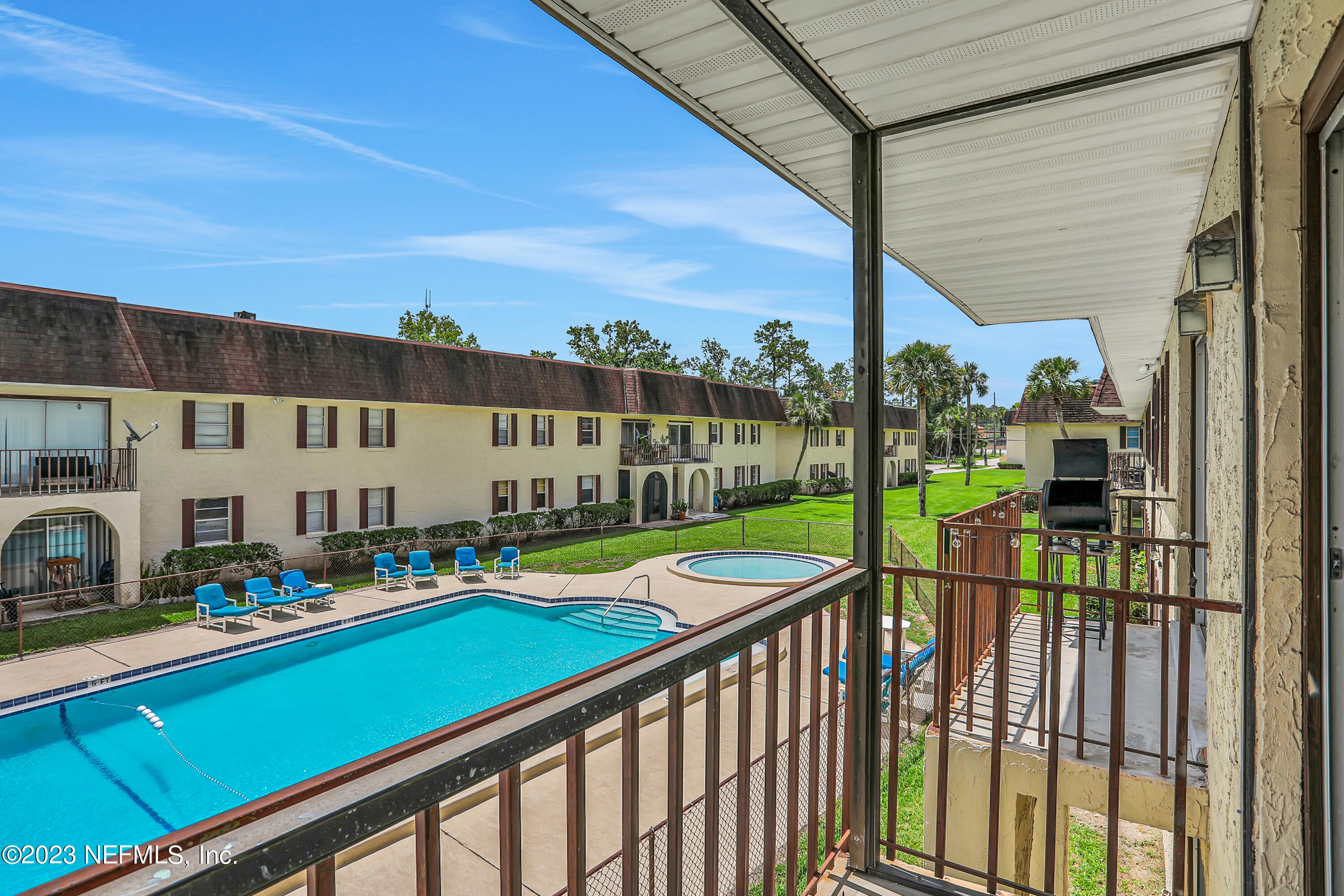 1735 El Camino Road, Unit 5 Jacksonville, FL 32216 - Photo 3 of 32 a view of swimming pool from a balcony