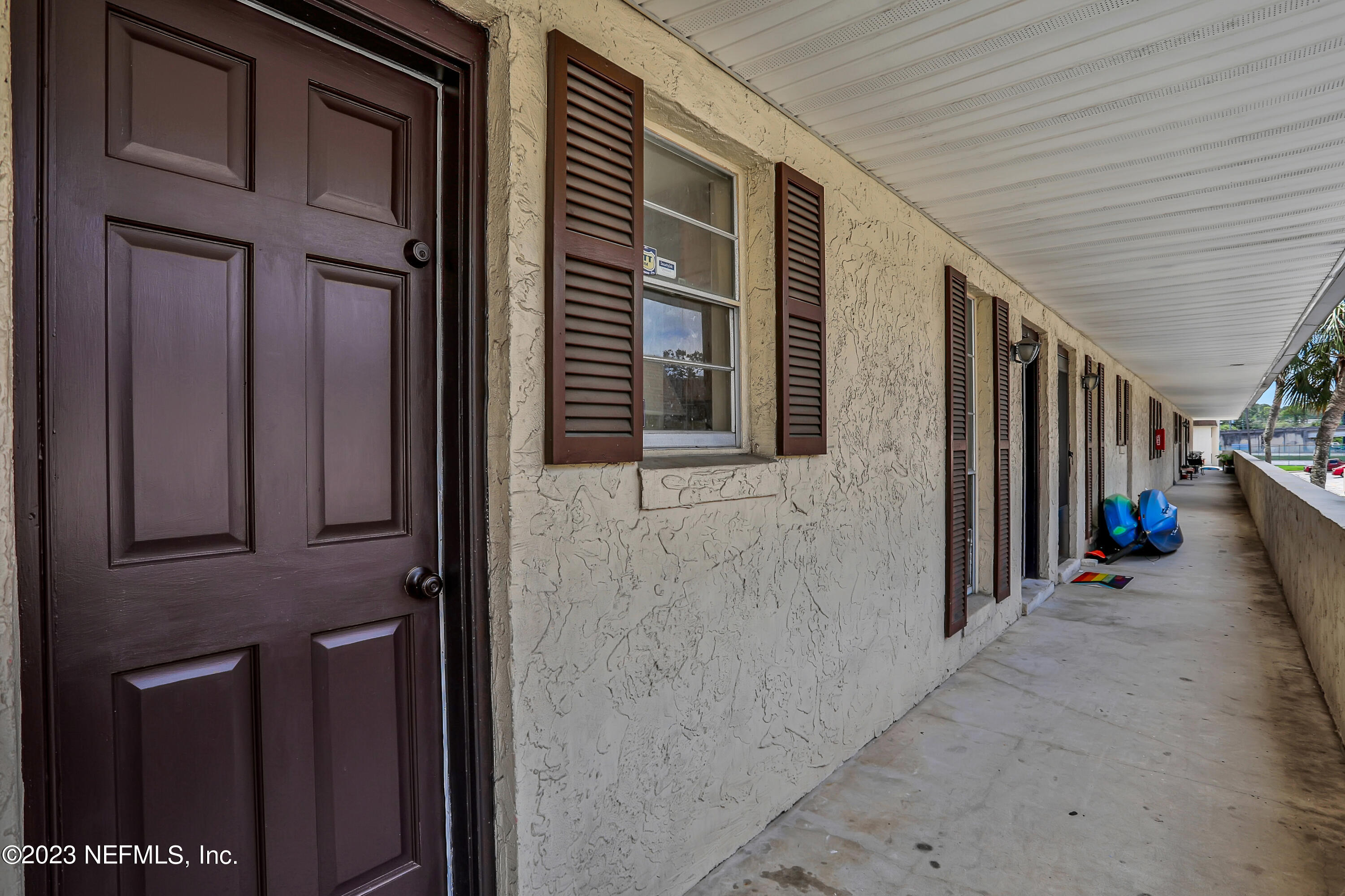 1735 El Camino Road, Unit 5 Jacksonville, FL 32216 - Photo 31 of 32 a view of a house with a door