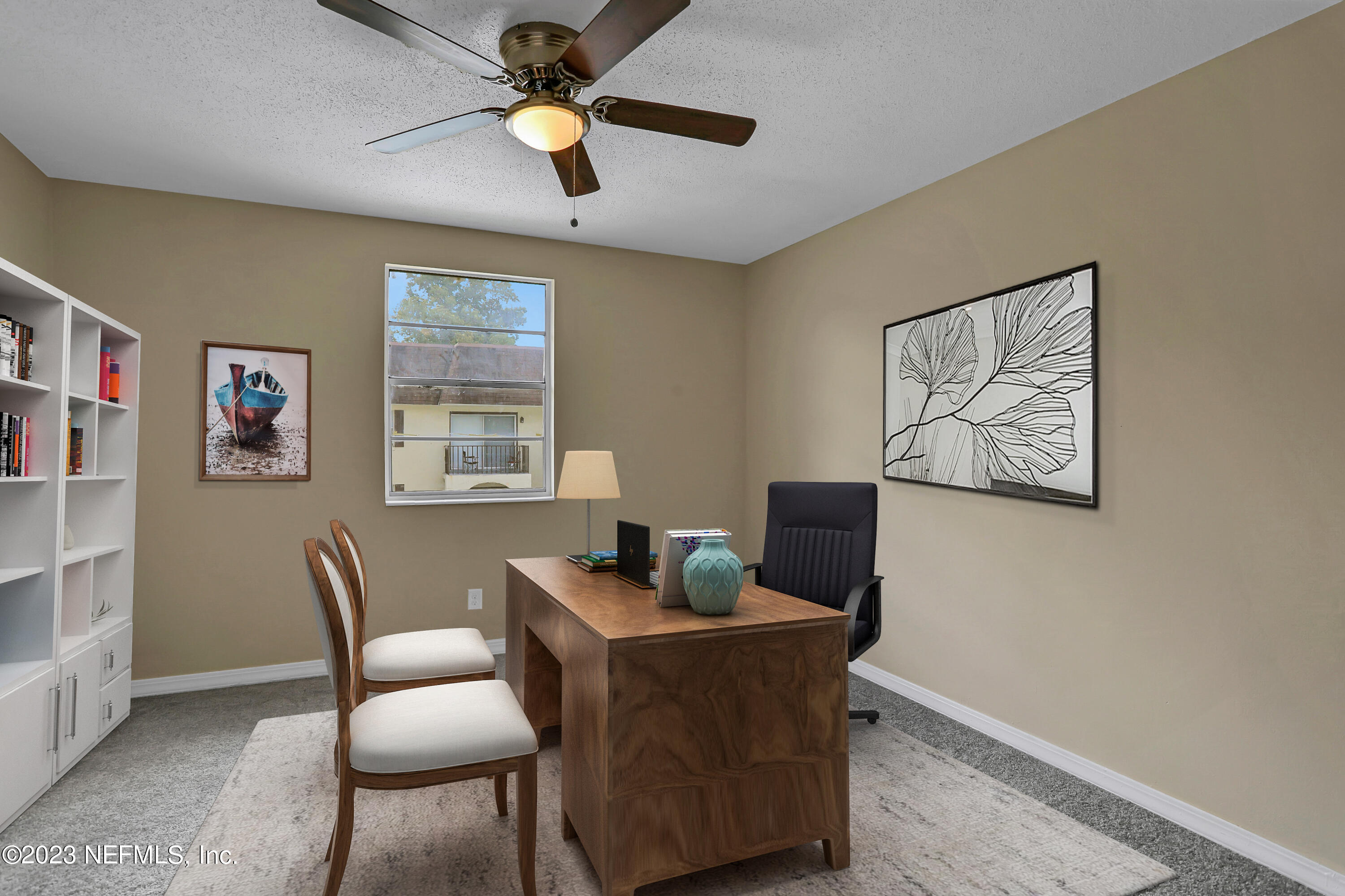 1735 El Camino Road, Unit 5 Jacksonville, FL 32216 - Photo 9 of 32 a living room with furniture and a window