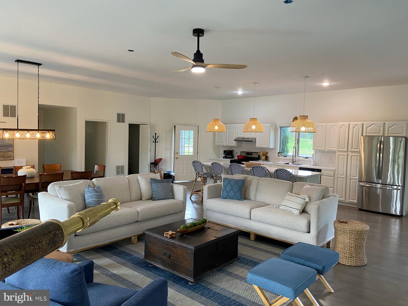 271 Ogden Farm Road Moorefield, WV 26836 - Photo 1 of 50 a living room with furniture and a chandelier