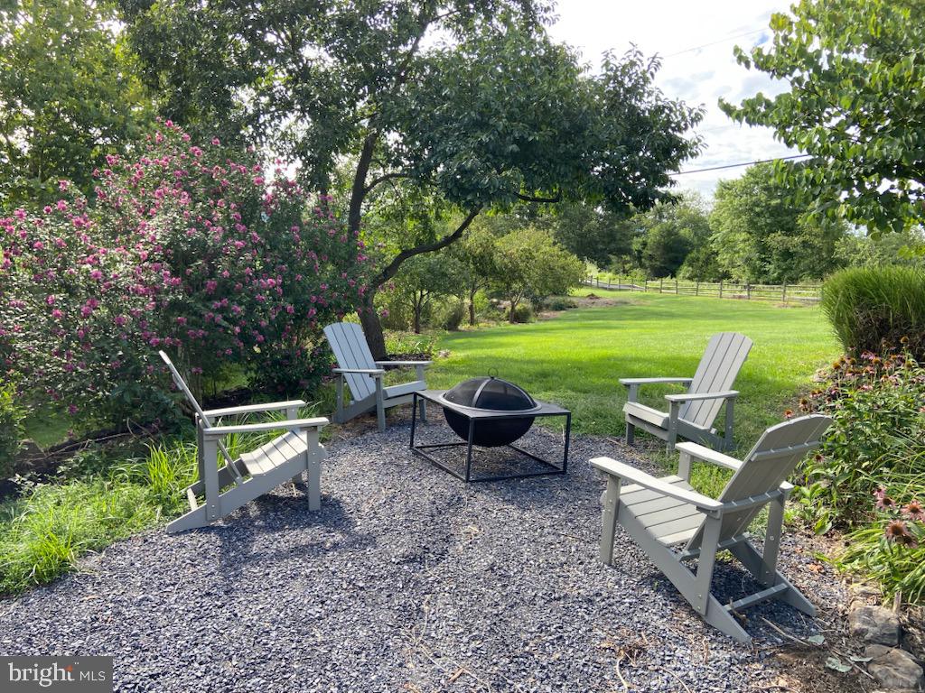 271 Ogden Farm Road Moorefield, WV 26836 - Photo 11 of 50 a view of a patio with chairs and plants