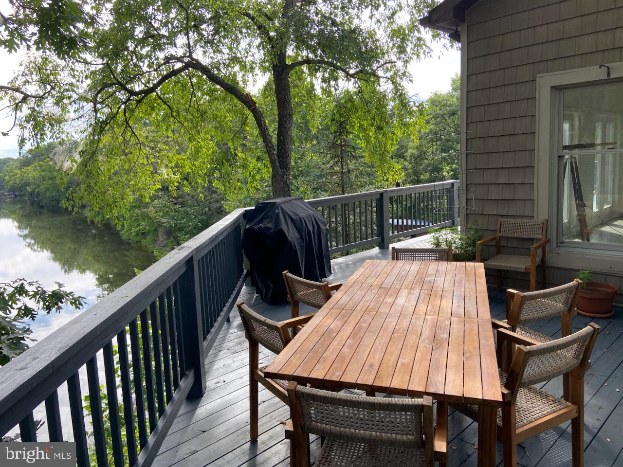 271 Ogden Farm Road Moorefield, WV 26836 - Photo 13 of 50 a view of balcony with wooden floor and outdoor seating