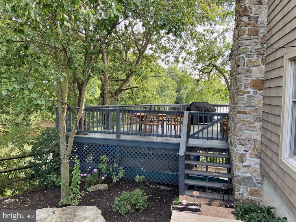 271 Ogden Farm Road Moorefield, WV 26836 - Photo 17 of 50 a view of a roof deck with wooden fence and floor