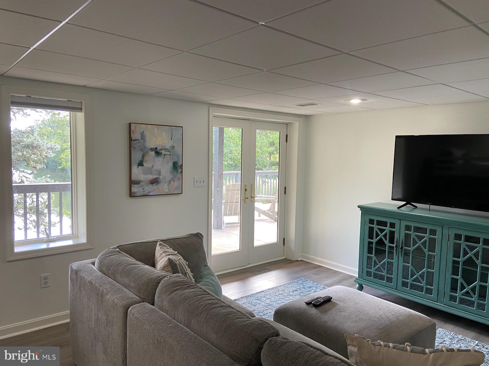 271 Ogden Farm Road Moorefield, WV 26836 - Photo 24 of 50 a living room with furniture and a flat screen tv