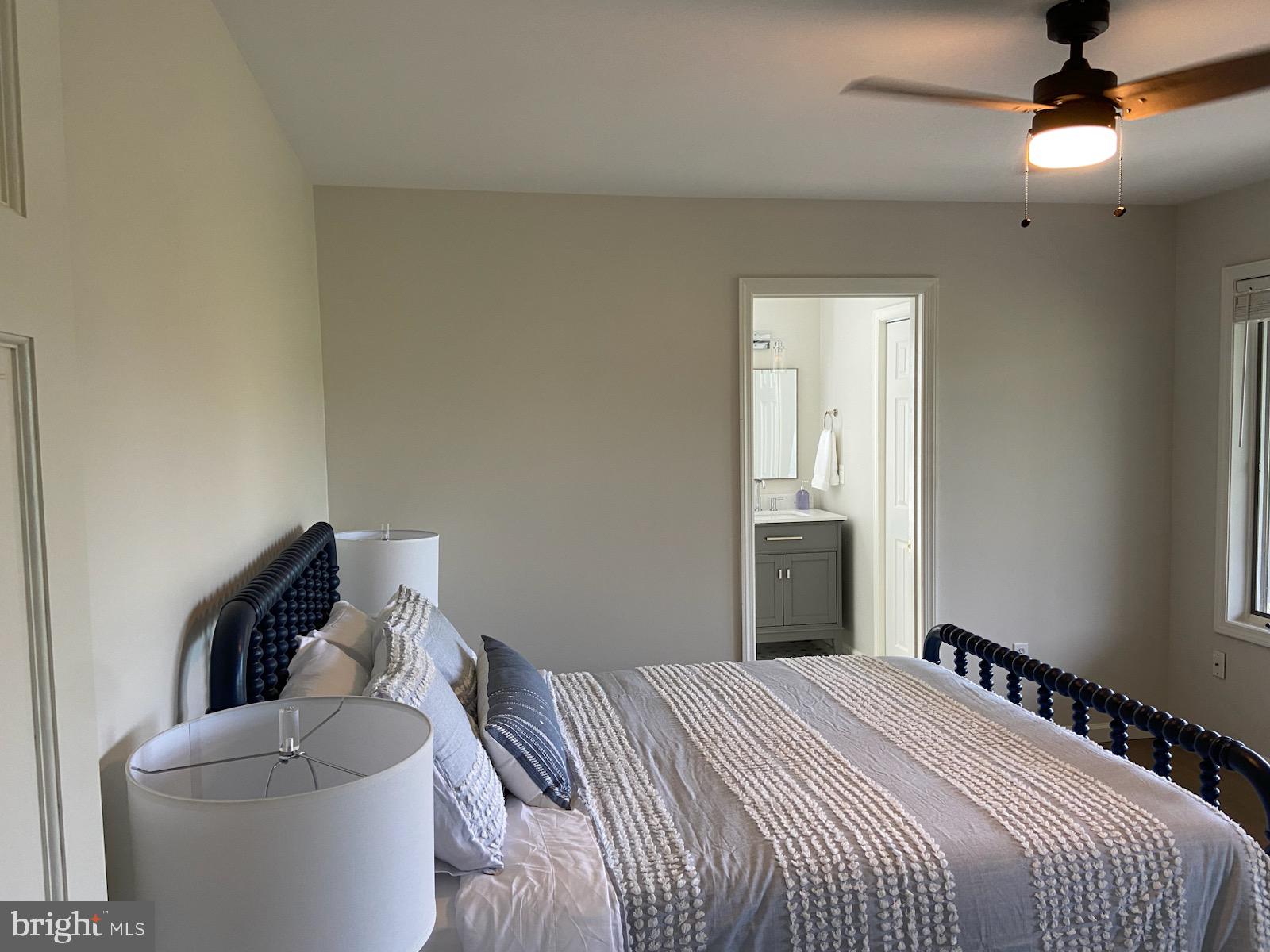 271 Ogden Farm Road Moorefield, WV 26836 - Photo 36 of 50 a bedroom with a bed and a couch