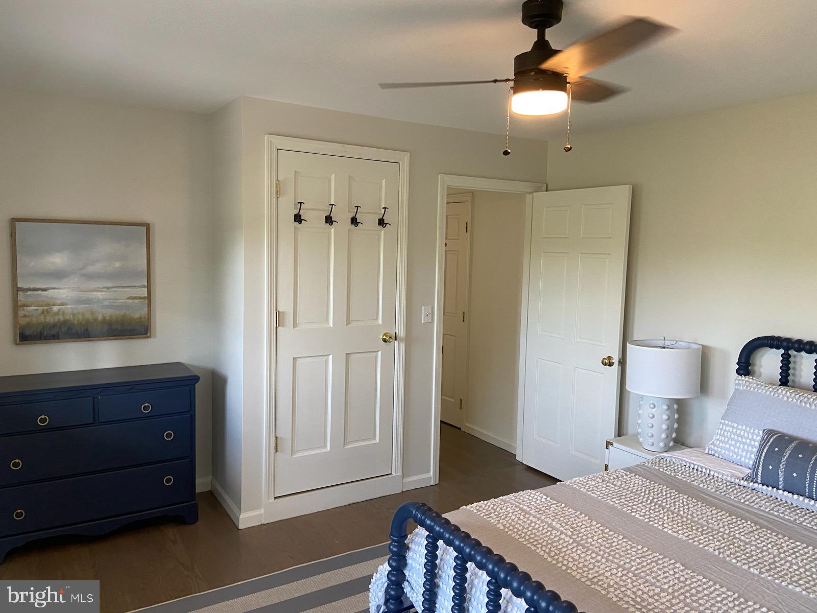271 Ogden Farm Road Moorefield, WV 26836 - Photo 38 of 50 a bedroom with a bed and a chandelier