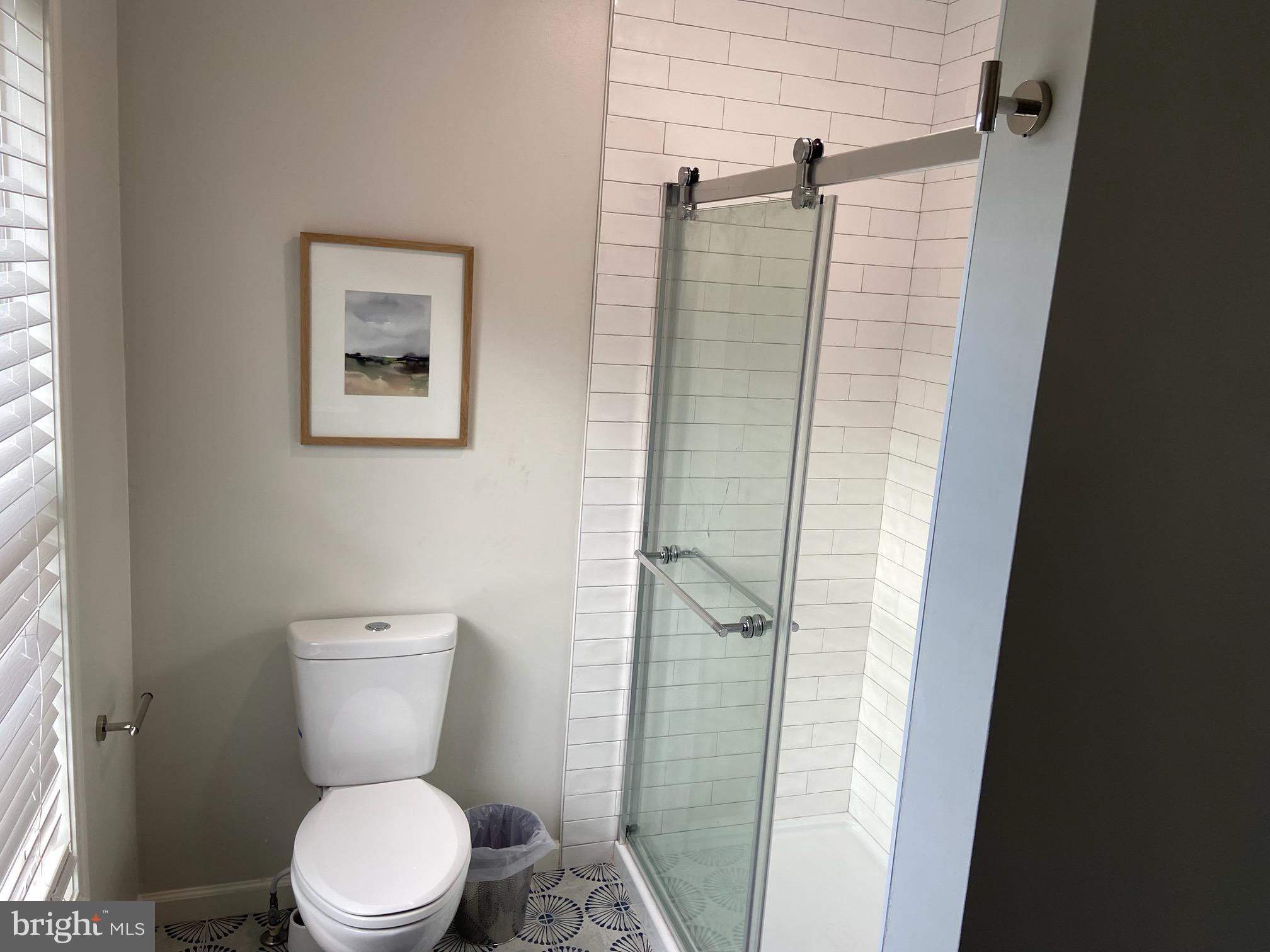 271 Ogden Farm Road Moorefield, WV 26836 - Photo 44 of 50 a white toilet sitting next to a shower