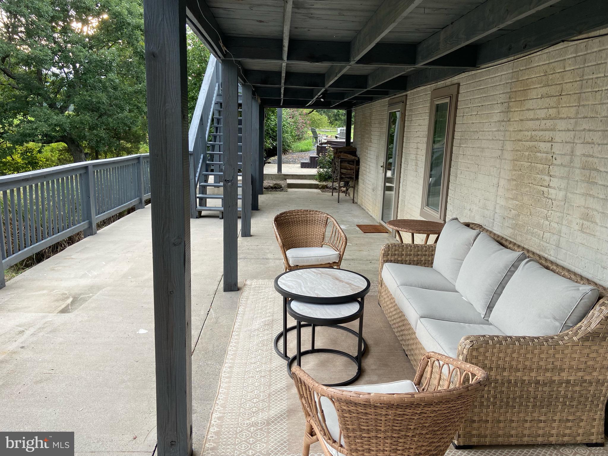 271 Ogden Farm Road Moorefield, WV 26836 - Photo 49 of 50 a view of a chairs and table in the balcony
