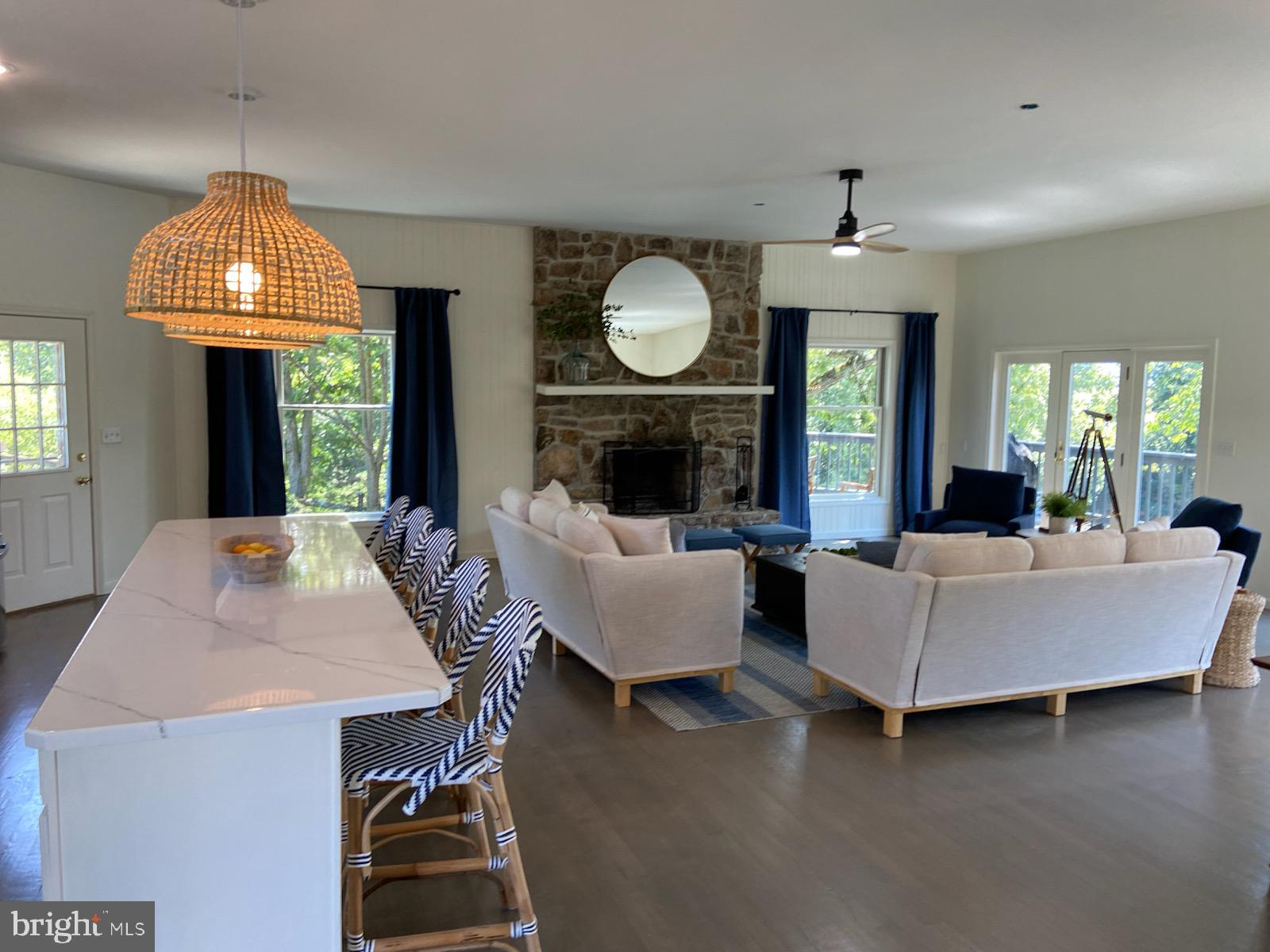 271 Ogden Farm Road Moorefield, WV 26836 - Photo 50 of 50 a living room with furniture a window and a chandelier