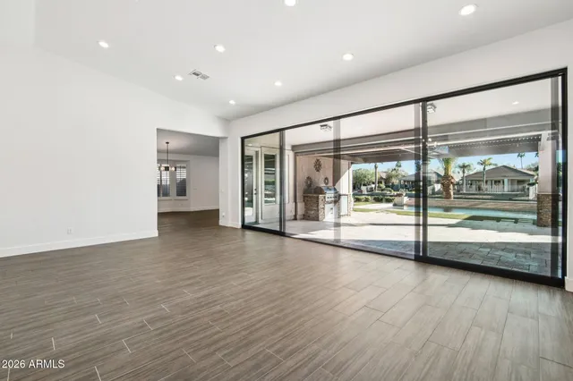 a view of a livingroom with wooden floor
