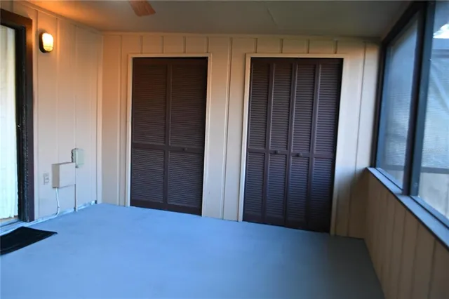 an empty room with windows