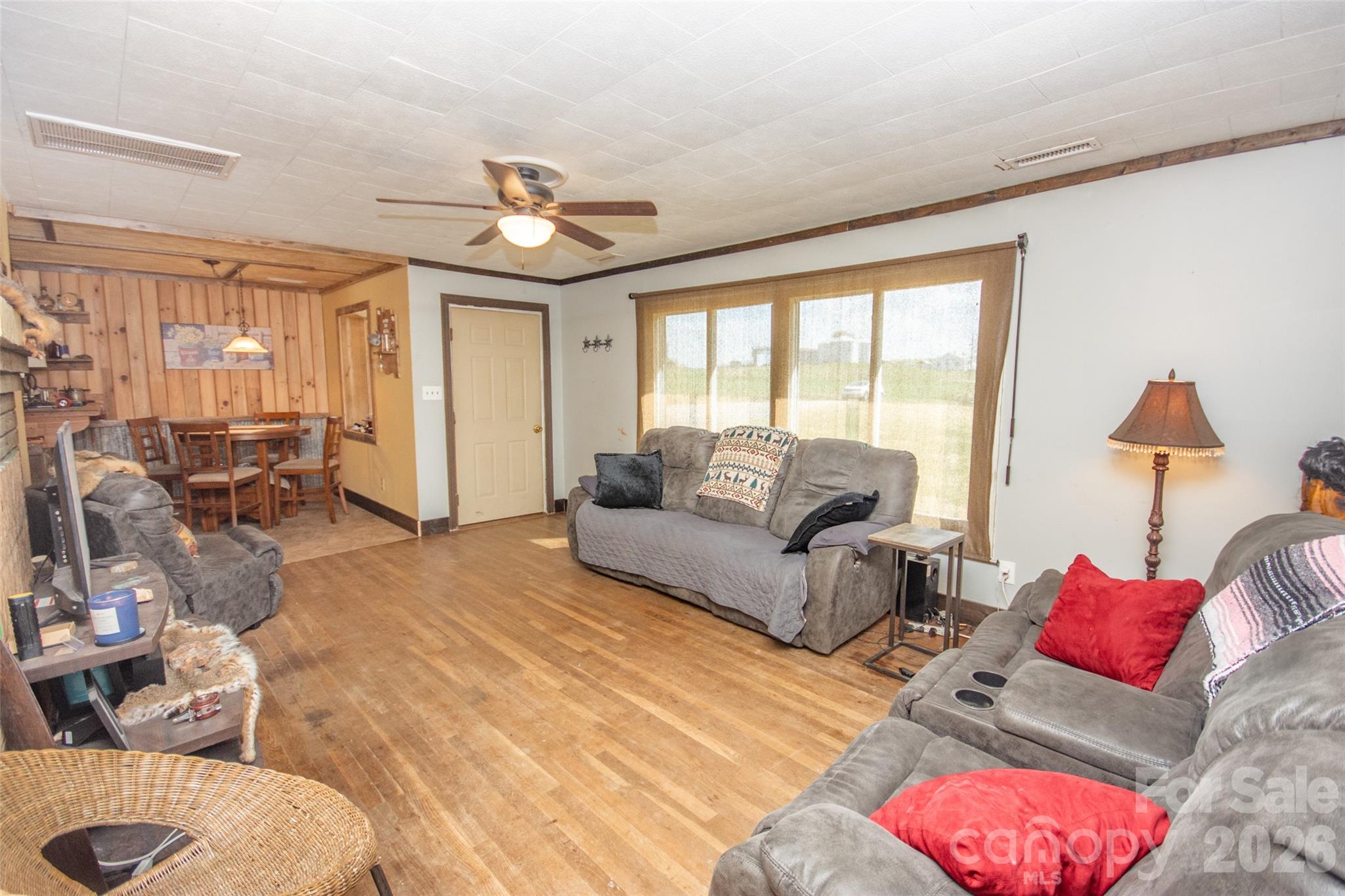 120 Mitch Road Union Grove, NC 28689 - Photo 13 of 24 a living room with furniture and a large window